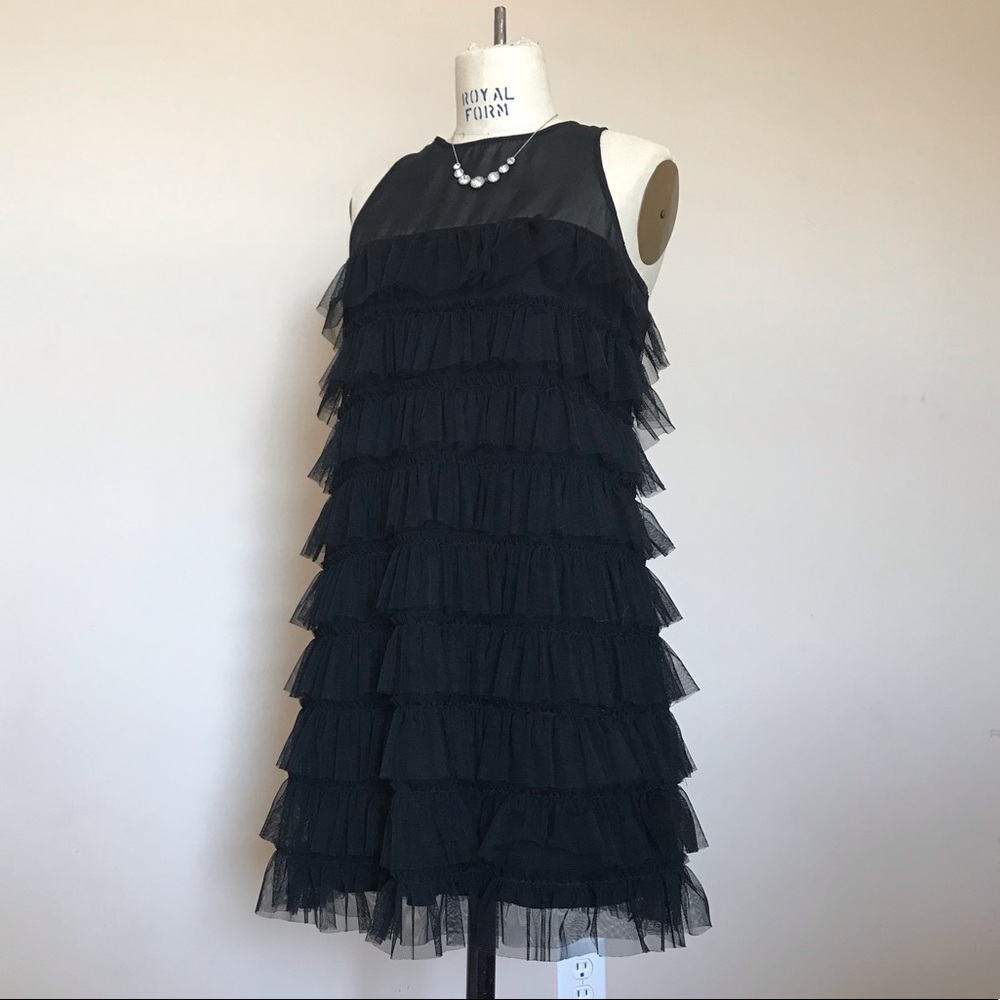 black ruffled, tulle dress. size large.